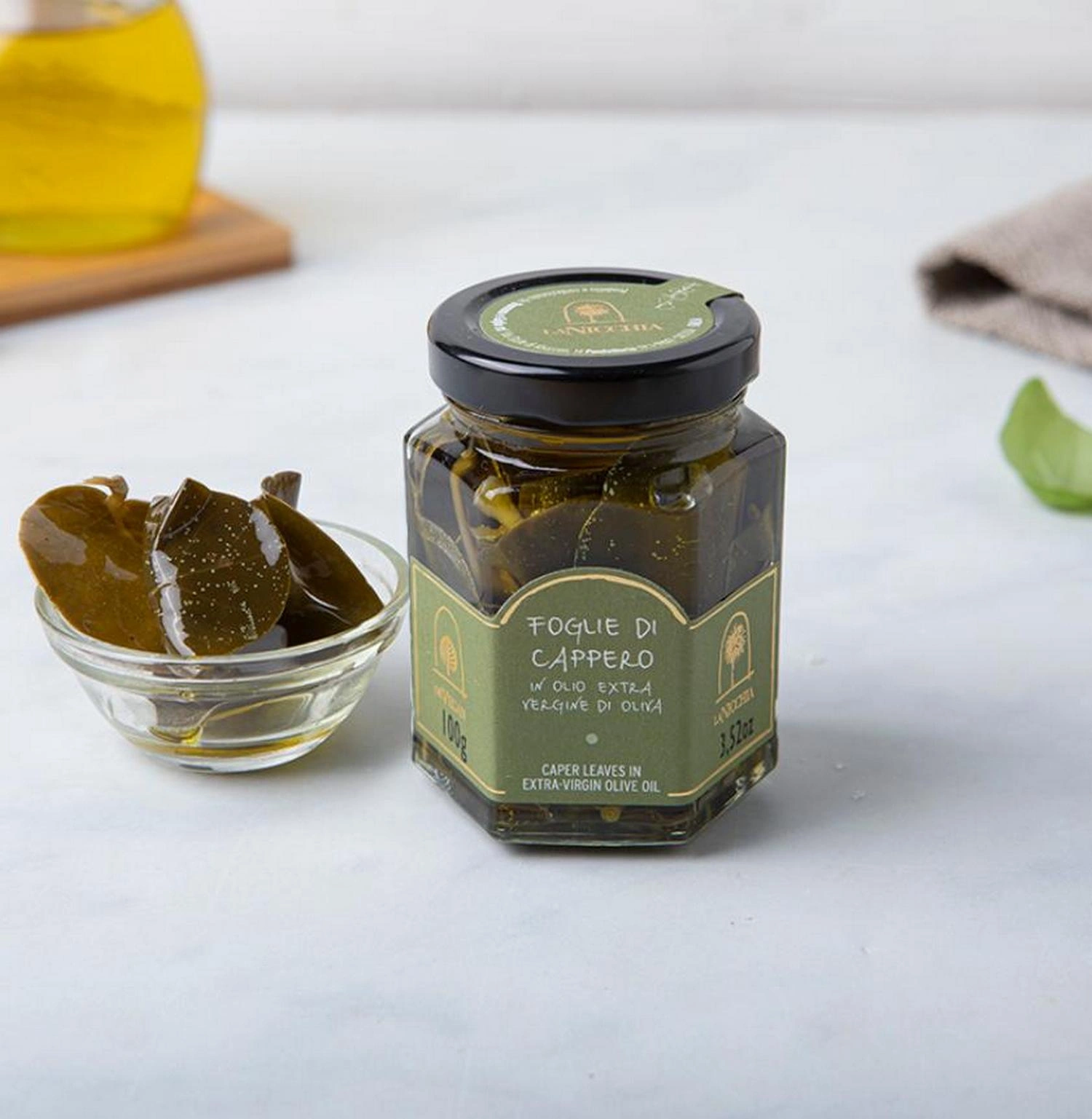 Foglie di Cappero in Olio Extravergine di Oliva - La Nicchia 100 g 1 Foglie di Cappero in Olio Extravergine di Oliva - La Nicchia 100 g 1